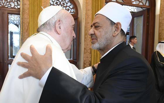 Pope Francis greets Sheikh Ahmad el-Tayeb, grand imam of Egypt's Al-Azhar mosque and university, at Sakhir Royal Palace Nov. 4 in Awali, Bahrain. (CNS/Vatican Media)