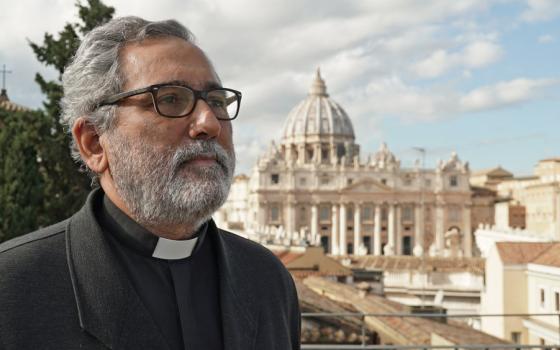 Juan Antonio Guerrero Alves with the Vatican in the background