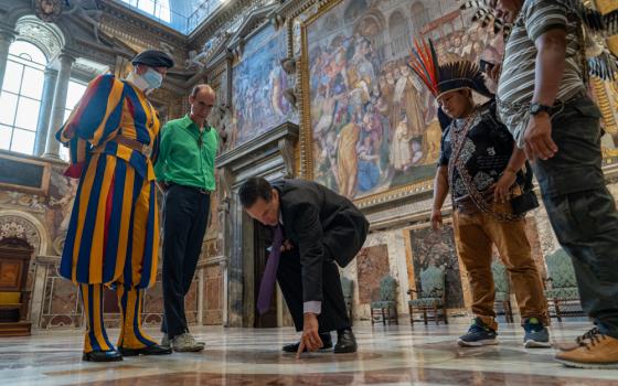 Greg Asner and Chief Dadá Borarí at Salla Reggia inside the Apostolic Palace in Vatican City (Courtesy of Lorenzo Magistrato)