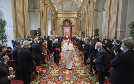 Pope Francis leaves after leading a meeting with judges, prosecutors, investigators and other members of the Vatican's state tribunal to formally open the court's judicial year at the Vatican March 12, 2022. (CNS photo/Vatican Media)