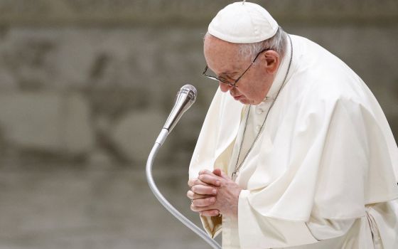 Pope Francis prays as he leads the weekly general audience at the Vatican Aug. 24, 2022. (CNS photo/Guglielmo Mangiapane, Reuters)