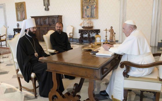 Pope Francis talks with Metropolitan Anthony of Volokolamsk, left, head of external relations for the Russian Orthodox Church, at the Vatican in this Aug. 5, 2022, file photo. 