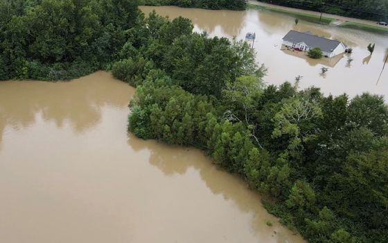 A building in Canton, Mississippi, is submerged amid flooding Aug. 24. (CNS/Tommy Keith Grant via Reuters) 