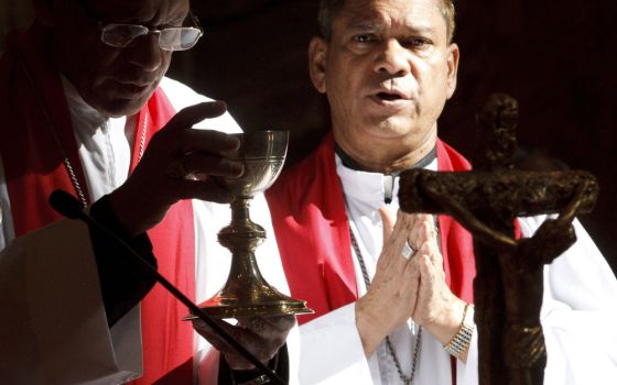 Cardinal Oswald Gracias of Mumbai, India, and Archbishop Felix A. Machado of Vasai, India, celebrate Mass at the Basilica of St. Paul Outside the Walls in Rome, Italy, Sept. 2, 2011