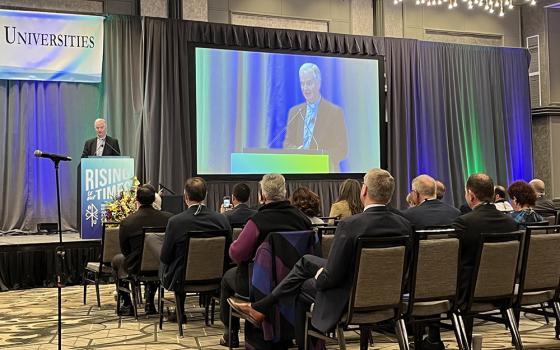 Bishop Paul Tighe, a secretary at the Vatican's Dicastery for Culture and Education, speaks to the meeting of the Association of Catholic Colleges and Universities in Washington on Feb. 6. (NCR photo/Joshua J. McElwee)