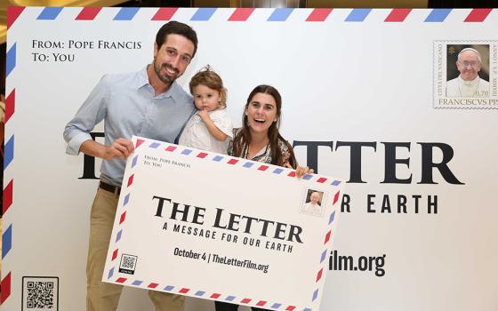 Tomás Insua, executive director of Laudato Si' Movement, poses with his family during the premiere of the documentary film "The Letter" Oct. 4, 2022, at the Vatican. (Laudato Si' Movement)