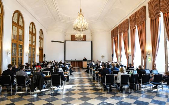 Cardinal Reinhard Marx of Munich and Freising, president of the German bishops' conference, gestures Sept. 13, 2019, during the extended Joint Conference of Bishops and Laity to prepare the "synodal way." The bishops of Germany, reacting to an independent study of the extent of clerical sexual abuse in their country and its possible causes, chose to initiate a "synodal" process that was not a synod or a plenary council. (CNS photo/Harald Oppitz, KNA)