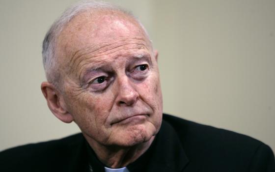 Former Washington Archbishop, Cardinal Theodore McCarrick listens during a press conference in Washington, May 16, 2006.