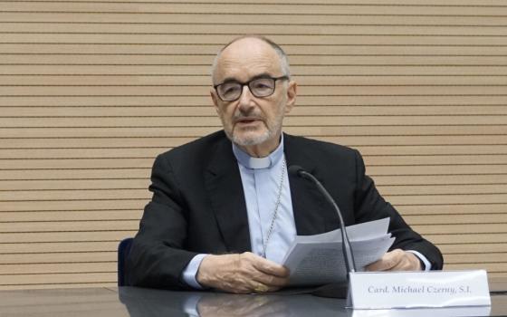 Cardinal Michael Czerny, prefect of the Vatican Dicastery for Promoting Integral Human Development, speaks at a news conference for the release of Pope Francis' message for the Jan. 1 celebration of World Peace Day at the Vatican Dec. 16, 2022. (CNS photo/Cindy Wooden)