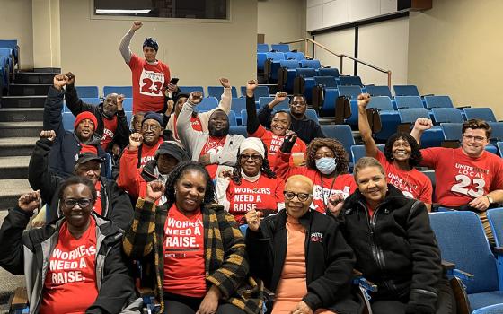 Sodexo food service employees at Loyola University New Orleans pose in solidarity during a teach-in organized by student activists, Unite Here Local 23 and the Catholic Labor Network last November. Workers won union representation this spring and are preparing for contract negotiations. (Courtesy of Unite Here)