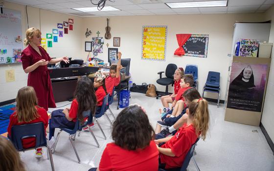 Megan Miller, a music teacher and orchestra director, teaches during an August 2019 class at St. Mary Catholic School in League City, Texas. (CNS/Texas Catholic Herald/James Ramos)