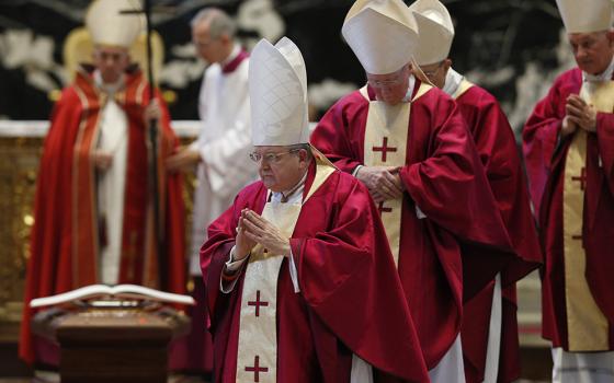 Pope Francis is pictured as U.S. Cardinal Raymond Burke, U.S. Cardinal J. Francis Stafford, German Cardinal Walter Kasper and Canadian Cardinal Marc Ouellet leave the funeral Mass of U.S. Cardinal William J. Levada in St. Peter's Basilica at the Vatican Sept. 27, 2019. (CNS/Paul Haring)