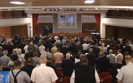 Members of the assembly of the Synod of Bishops recite morning prayer during their retreat outside of Rome in this screen grab from Oct. 2. (CNS/Vatican Media via YouTube)