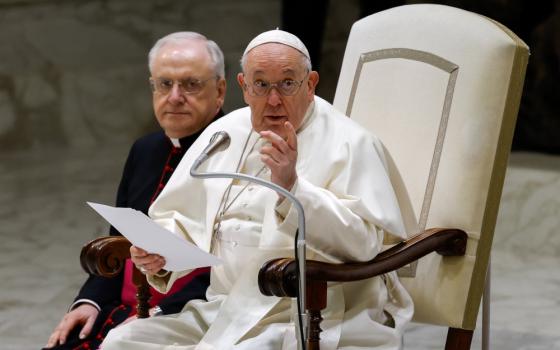 Pope Francis speaks to Vatican employees and their families ahead of Christmas in the Paul VI Audience Hall at the Vatican Dec. 21, 2023. (CNS photo/Lola Gomez)