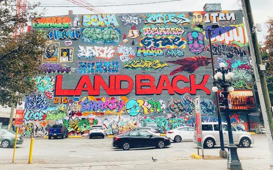 "Abbott Street," a photo of graffiti that says "LANDBACK," taken in Vancouver, Oct. 22.2022. (Flickr/Edna Winti, CC BY 2.0)