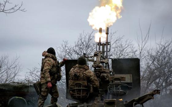 Ukrainian servicemen from the air defense unit of the 93rd Mechanized Brigade fire an anti-aircraft cannon from a front-line position near the town of Bakhmut on March 6, amid Russia's attack on Ukraine. 