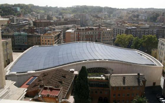 Solar panels cover the roof of the Vatican's Paul VI audience hall in this photo released by the Vatican in 2008. The hall's original concrete roof was replaced with panels of photo-electric cells, generating the city's first solar power. (CNS photo/Vatican)
