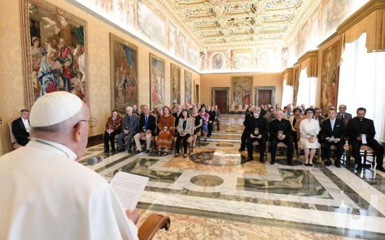 Pope Francis meets with cosmologists, theoretical physicists and scientists taking part in a conference about black holes and gravitational waves during a private audience at the Vatican June 20, 2024. (CNS/Vatican Media)