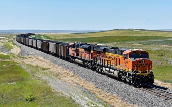 A BNSF railroad train hauling carloads of coal from the Powder River Basin of Montana and Wyoming travels east of Hardin, Montana, July 15, 2020. (AP/Matthew Brown, file)