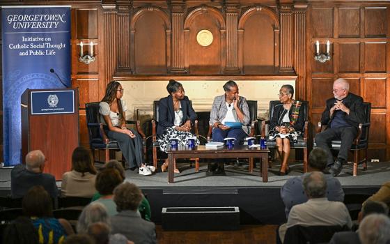 Participants in Georgetown University's June 4 panel discussion on "The Civil Rights Act of 1964 After 60 Years" were, from left: Kessley Janvier, Diann Rust-Tierney, moderator Kimberly Mazyck, Mercy Sr. Cora Marie Billings and the Rev. Jim Wallis. (Courtesy of Georgetown University/Rafael Suanes)