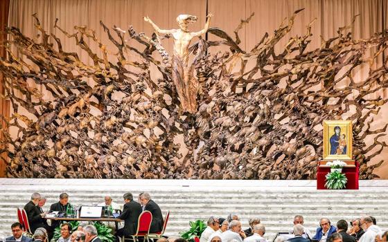 Pope Francis and members of the assembly of the Synod of Bishops gather for a working session in the Vatican's Paul VI Audience Hall Oct. 23, 2023. (CNS/Lola Gomez)