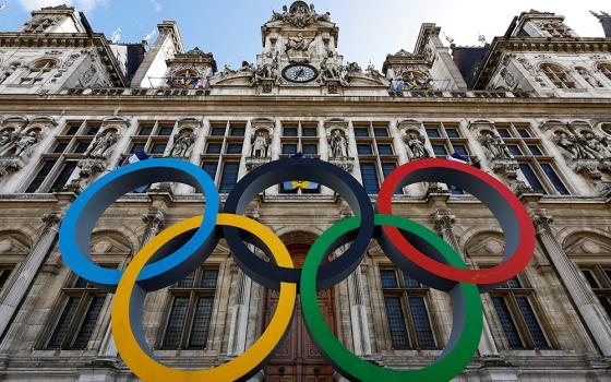 The Olympic rings are seen in front of the Hotel de Ville City Hall in Paris March 14, 2023. The Olympics will take place July 26 - Aug. 11. (OSV News/Reuters/Gonzalo Fuentes)