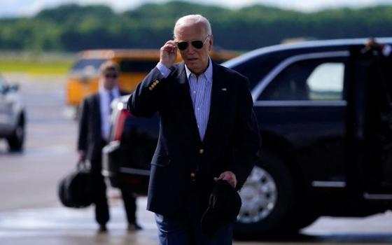 U.S. President Joe Biden walks at Dane County Regional Airport, in Madison, Wisconsin July 5.