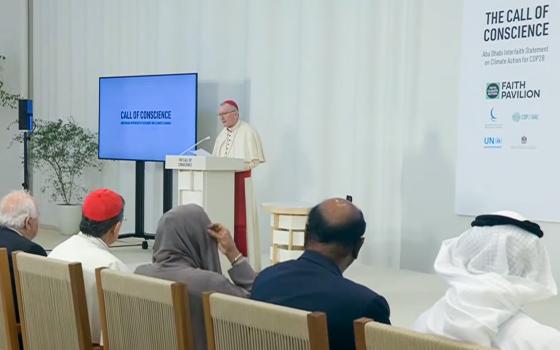 Cardinal Pietro Parolin, Vatican secretary of state, is seen in this screen grab reading Pope Francis' speech for the inauguration of the Faith Pavilion at COP28, the U.N. Climate Change Conference, in Dubai, United Arab Emirates, Dec. 3, 2023. 