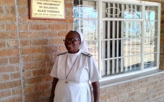 Precious Blood Sr. Caroline Busvumani stands at the entrance of the Precious Blood Care Centre in Bulawayo, Zimbabwe. The center opened in 2022 amid a spike in drug and substance abuse in Zimbabwe. (Marko Phiri)