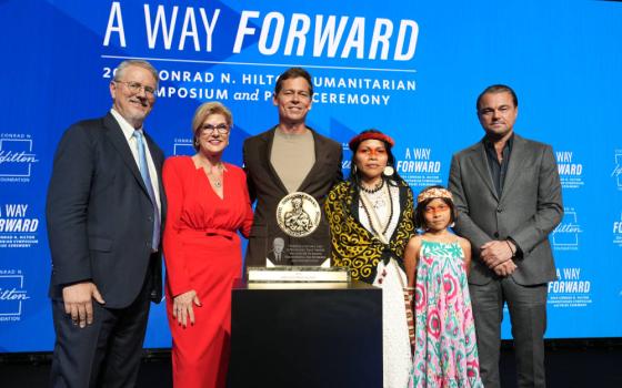 Peter Laugharn, president and CEO, Conrad N. Hilton Foundation, from left, Linda Hilton, chair of the board, Conrad N. Hilton Foundation, Mitch Anderson, executive director and co-founder, Amazon Frontlines, Nemonte Nenquimo, co-founder, Amazon Frontlines, Daime and  actor and environmentalist Leonardo DiCaprio at the 2024 Hilton Humanitarian Prize Ceremony honoring Amazon Frontlines at The Beverly Hilton, Wednesday, Oct. 9, 2024 in Beverly Hills, Calif. (Jordan Strauss/AP Content Services for Conrad N. Hil