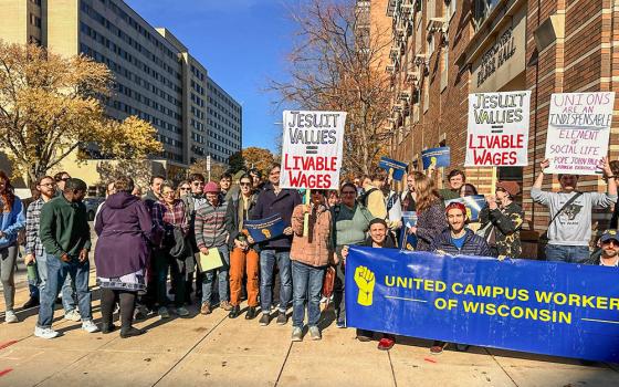 More than 50 Marquette University students, staff and faculty rally on campus Nov. 8 in Milwaukee, in support of the unionization effort of non-tenure-track employees from Marquette's Klingler College of Arts and Sciences. (Ericka Tucker)