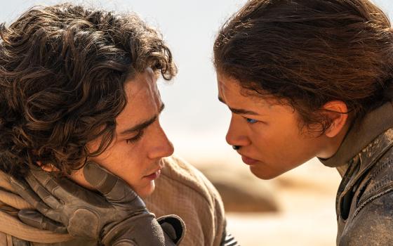 Timothée Chalamet and Zendaya star in a scene from the movie "Dune: Part Two." (OSV News/Warner Bros./Niko Tavernise)