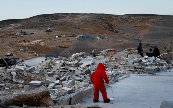 In "No Other Land," Palestinian activist and co-director Basel Adra chronicles the destruction of a Palestinian village in Masafer Yatta, a community struggling to survive and fighting for its basic rights in the Israeli-occupied West Bank. (Dogwoof)