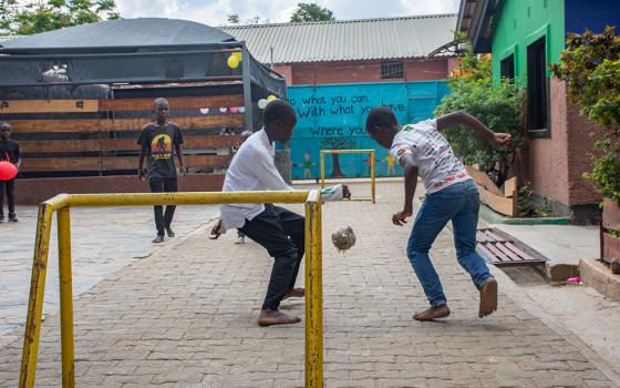 Young boys enjoy a game of soccer during their spare time at St. Lawrence Home of Hope in Lusaka, Zambia. (Derrick Silimina)