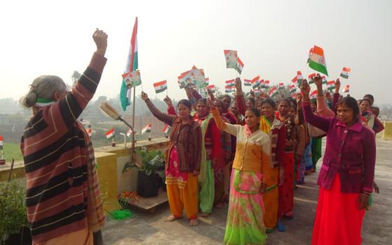 Missionary Sister of the Queen of Apostles Ajita Mathew Vettikuzhakunnel celebrates India's Independence Day with    members of her women's group in Uttar Pradesh in northern India. (Courtesy of Ajita Mathew Vettikuzhakunnel)