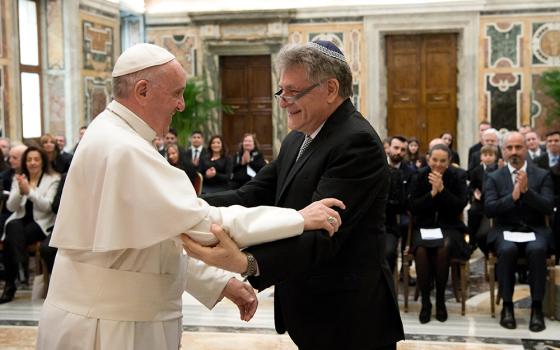 Pope Francis greets his longtime friend Rabbi Abraham Skorka during a meeting with an interreligious group of scholars at the Vatican Feb. 23. Pope Francis died April 21, 2025, at age 88. Rabbi Shmuly Tanklowitz writes that Francis "was the type of role model we want to see in the world." (CNS photo/L'Osservatore Romano)