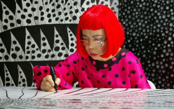 Artist Yayoi Kusama draws in "Kusama: Infinity." (Courtesy of Magnolia Pictures/Tokyo Lee Productions Inc.)