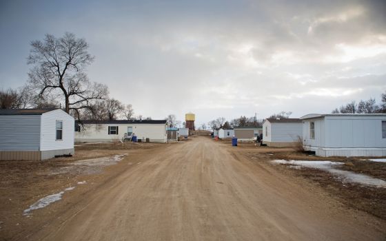 Homes line a dirt road in 2014 on the Rosebud Reservation of the Lakota in south central South Dakota. (CNS/Catholic Extension/Ron Wu)