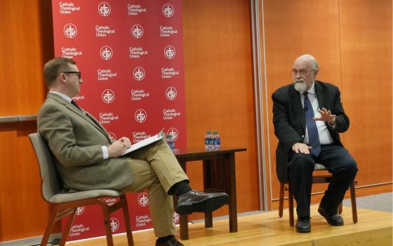 Steven Millies, left, and Precious Blood Fr. Robert Schreiter discuss "Peacebuilding at a Time of Political Polarization" in an event sponsored by the Bernardin Center at Catholic Theological Union in Chicago Dec. 1. (Catholic Theological Union)