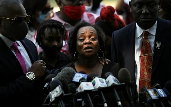 Julia Jackson (center), mother of Jacob Blake, who was shot several times in the back by a police officer, speaks during a press conference outside the Kenosha County Courthouse in Kenosha, Wisconsin, Aug. 25. (Newscom/Reuters/Stephen Maturen)