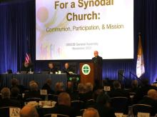 Bishop Kevin C. Rhoades of Fort Wayne-South Bend, Ind., speaks during a conversation about the synod on synodality in Rome at a Nov. 14, 2023, session of the fall general assembly of the U.S. Conference of Catholic Bishops in Baltimore. Also pictured are Fr. Michael J.K. Fuller, USCCB general secretary; Archbishop Timothy Broglio of the U.S. Archdiocese for the Military Services, USCCB president; and Archbishop William Lori of Baltimore, USCCB vice president. (OSV News/Bob Roller)