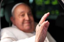 Pope Francis waves to visitors from a car as he arrives in St. Peter’s Square to preside over Mass for the Jubilee of the Armed Services, Police and Security Personnel at the Vatican Feb. 9, 2025. (CNS photo/Lola Gomez)