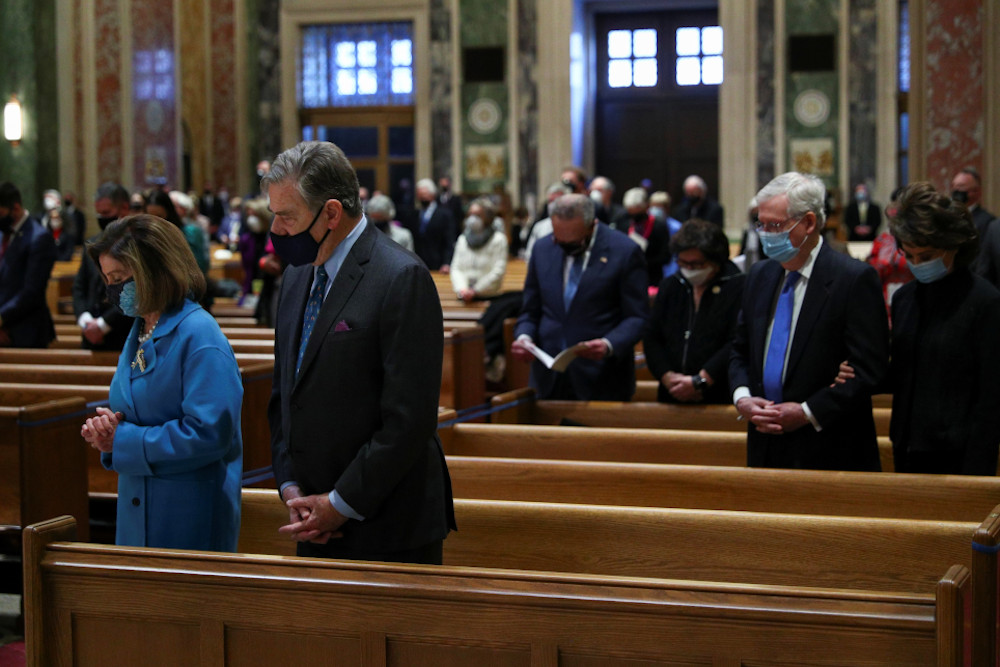 House Speaker Nancy Pelosi, and her husband, Paul Pelosi, Senate Majority Leader Mitch McConnell, and his wife, former Secretary of Transportation Elaine Chao, and Senate Minority Leader Chuck Schumer, with booklet, and his wife, Iris Weinshall, attend Ma