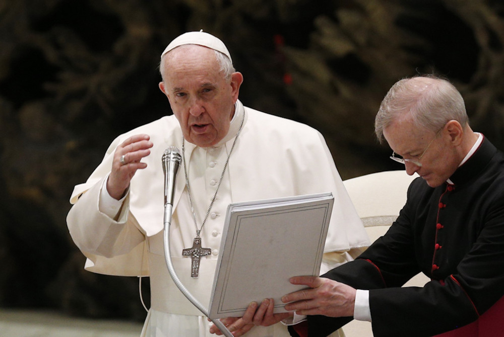 Pope Francis delivers his blessing during his general audience in the Paul VI hall at the Vatican Oct. 27. (CNS/Paul Haring)